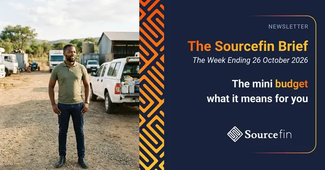 Business owner in an olive shirt standing in a depot yard beside a loaded white bakkie